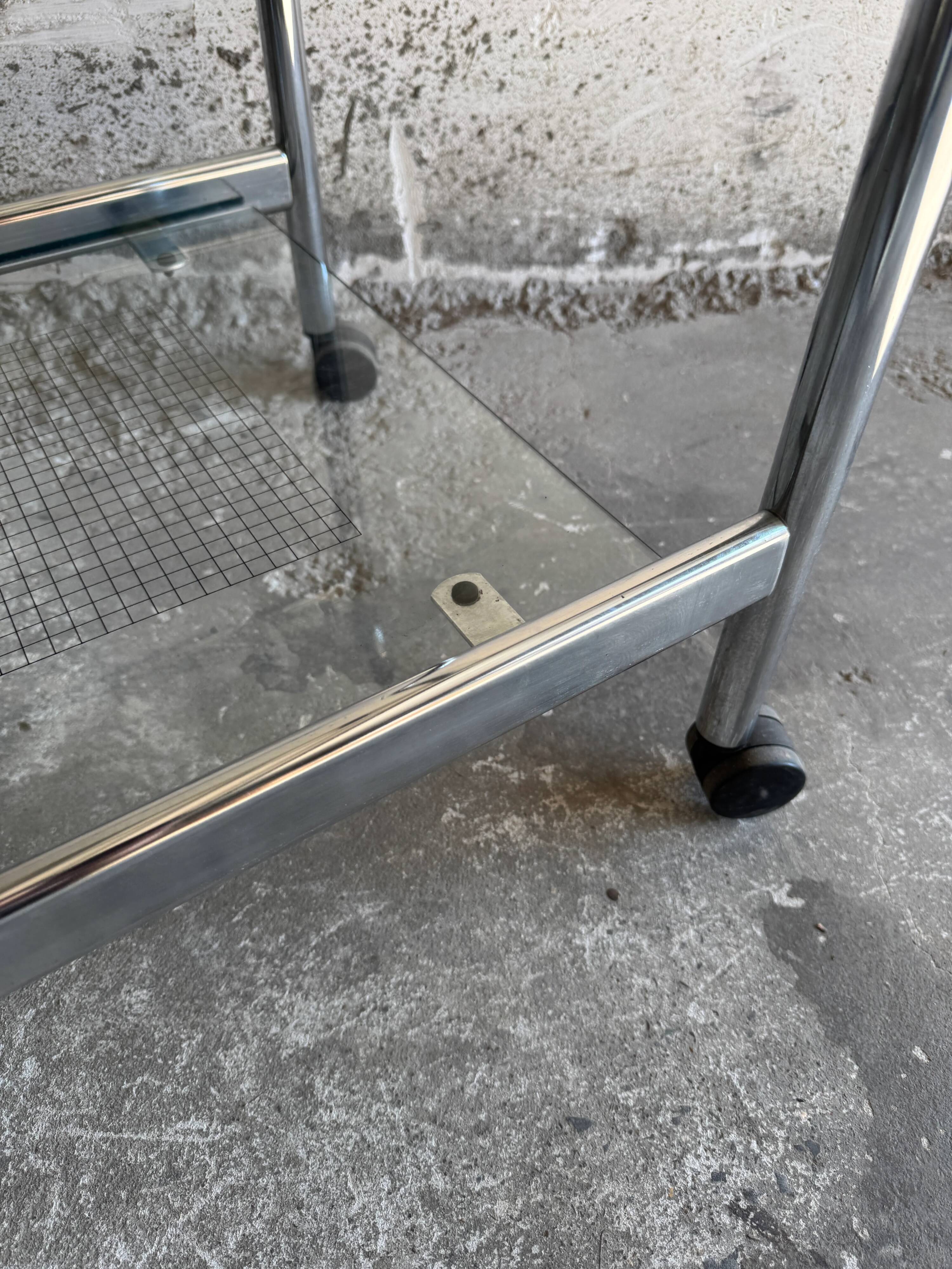 Vintage silver chrome-plated steel and glass two-tier serving trolley with wheels