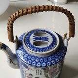 Japanese-inspired porcelain teapot.otifs Geishas kimonos, cherry blossoms