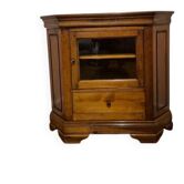 Wooden TV unit with a rotating top.