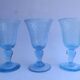 5 glasses with blue Biot stemmed