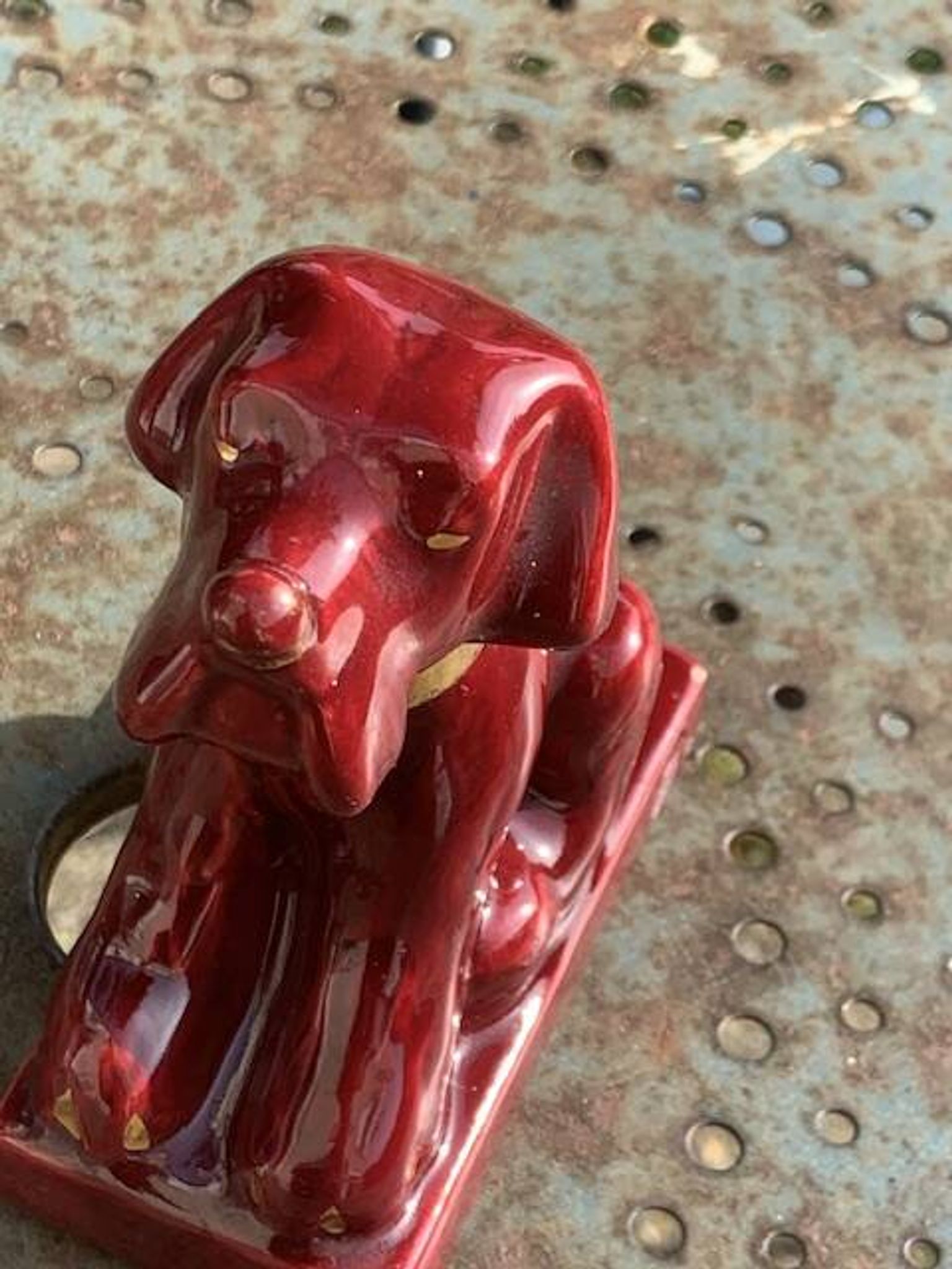 Dog sign CAB in vintage burgundy red enameled ceramic slip, art deco