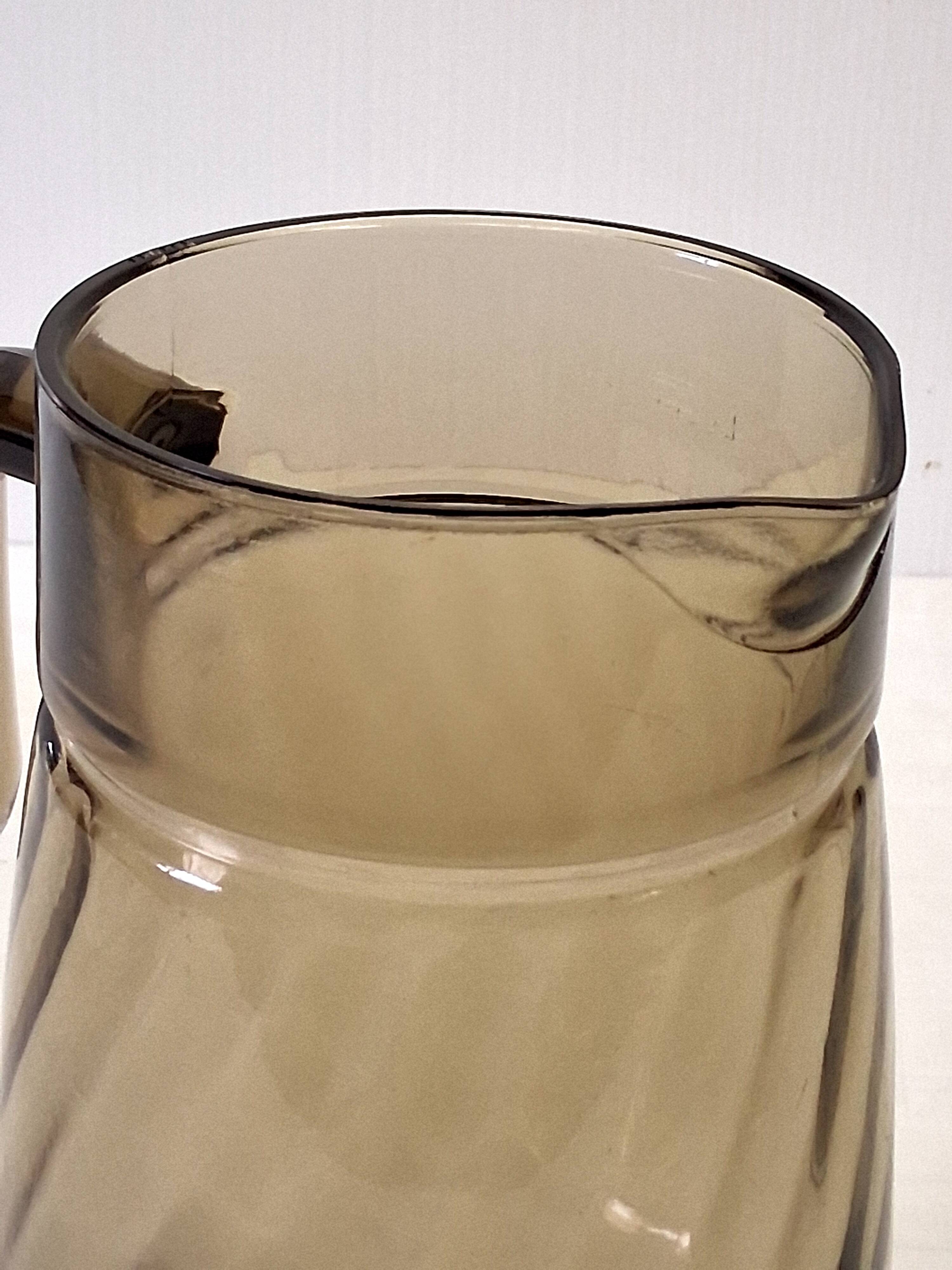 Very pretty black smoked glass pitcher from Lever in very good condition.