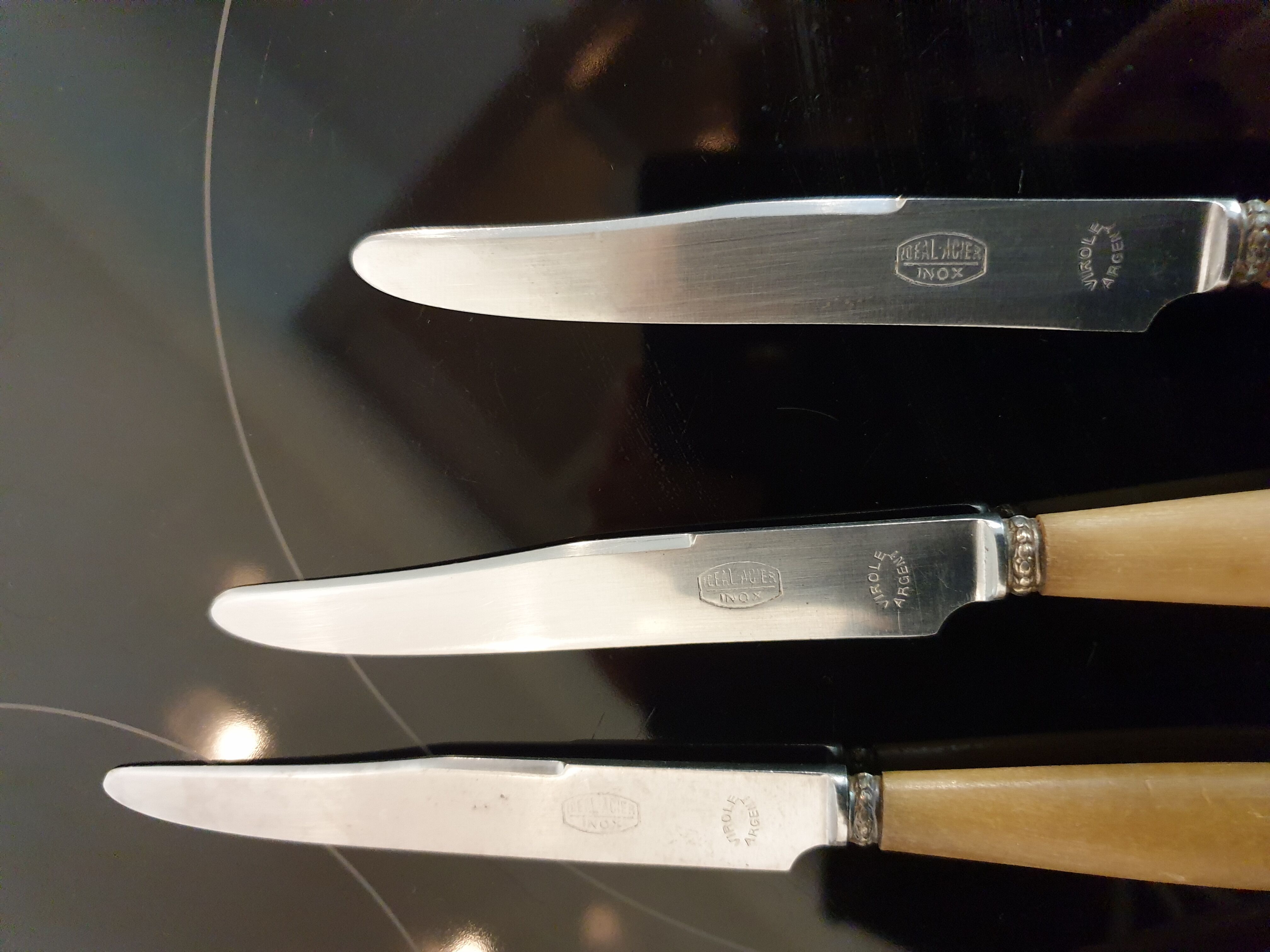 10 couteaux en corne virole en argent