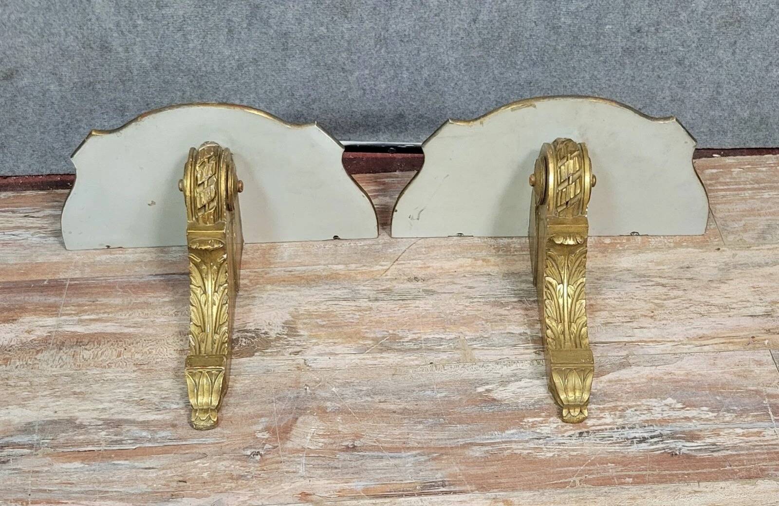 Pair of Louis XV style wall consoles in gilded wood