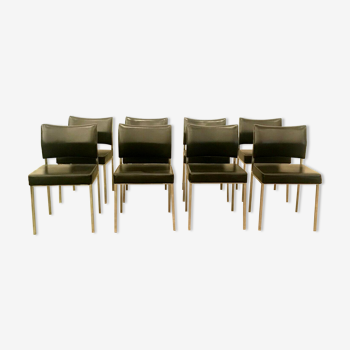 Suite of eight vintage chairs in chrome and imitation leather XX century