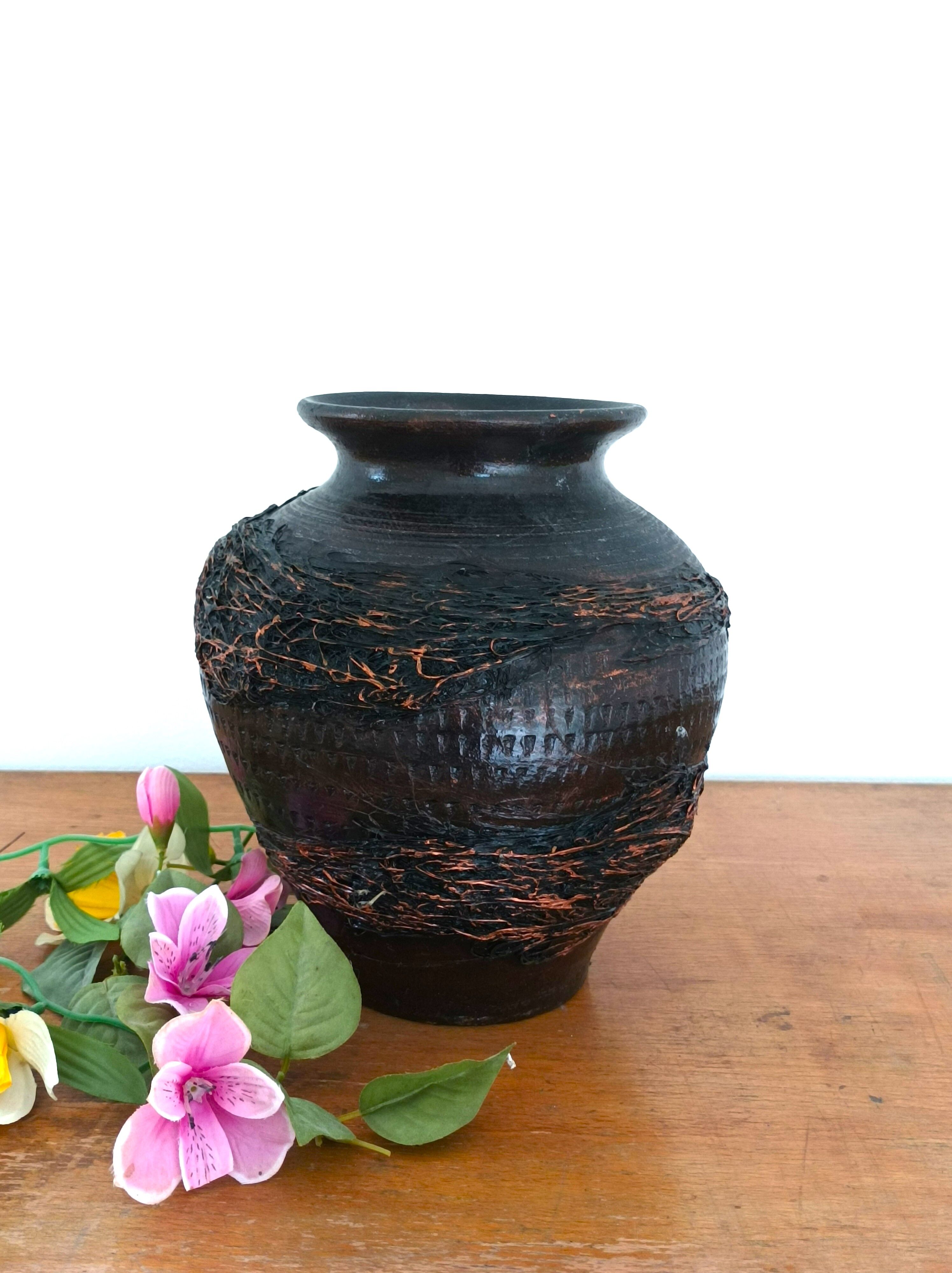 Black varnished terracotta pot
