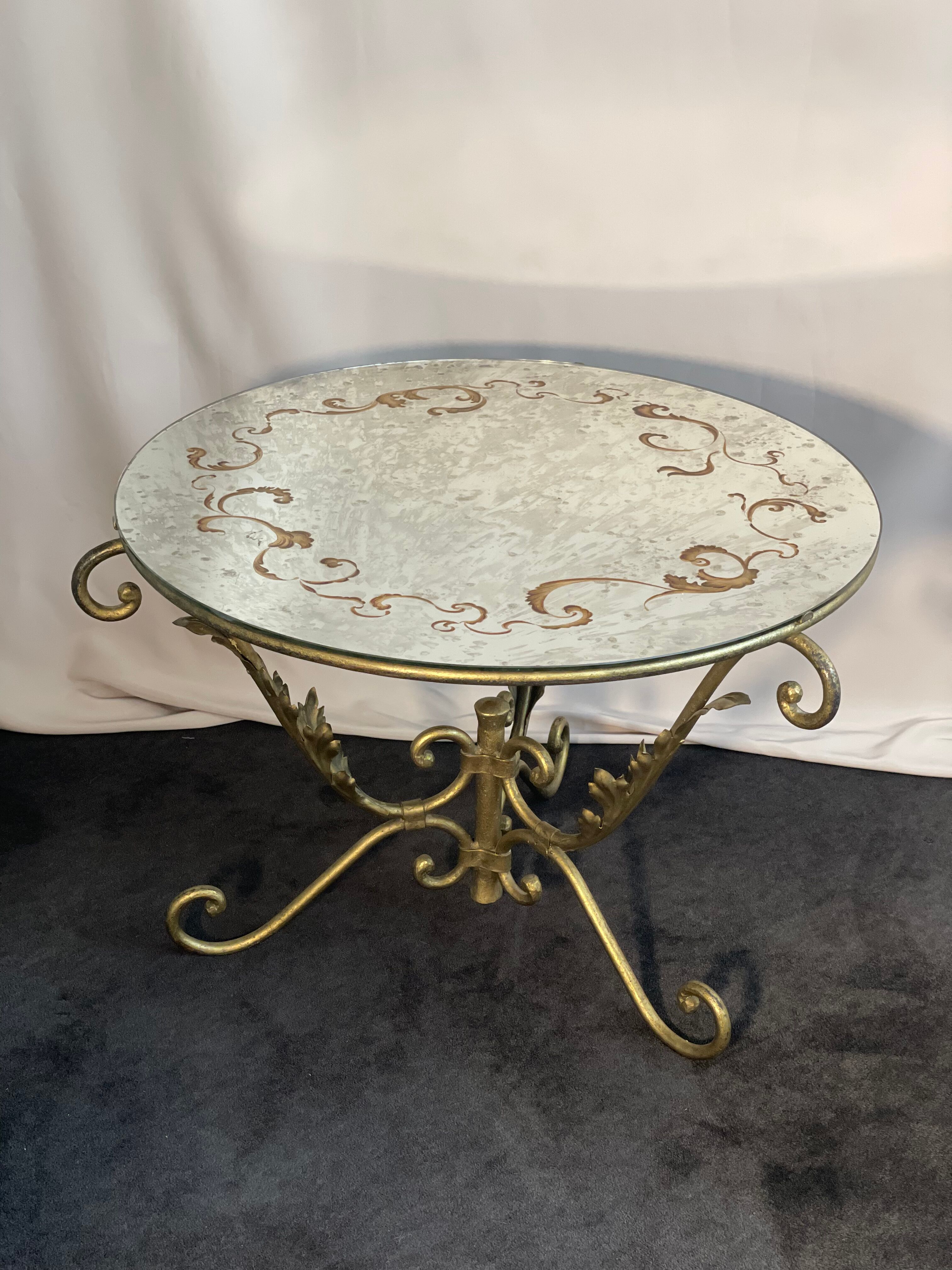 Round coffee table base in gilded wrought iron beautiful top enamelled glass 50s