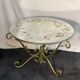 Round coffee table base in gilded wrought iron beautiful top enamelled glass 50s