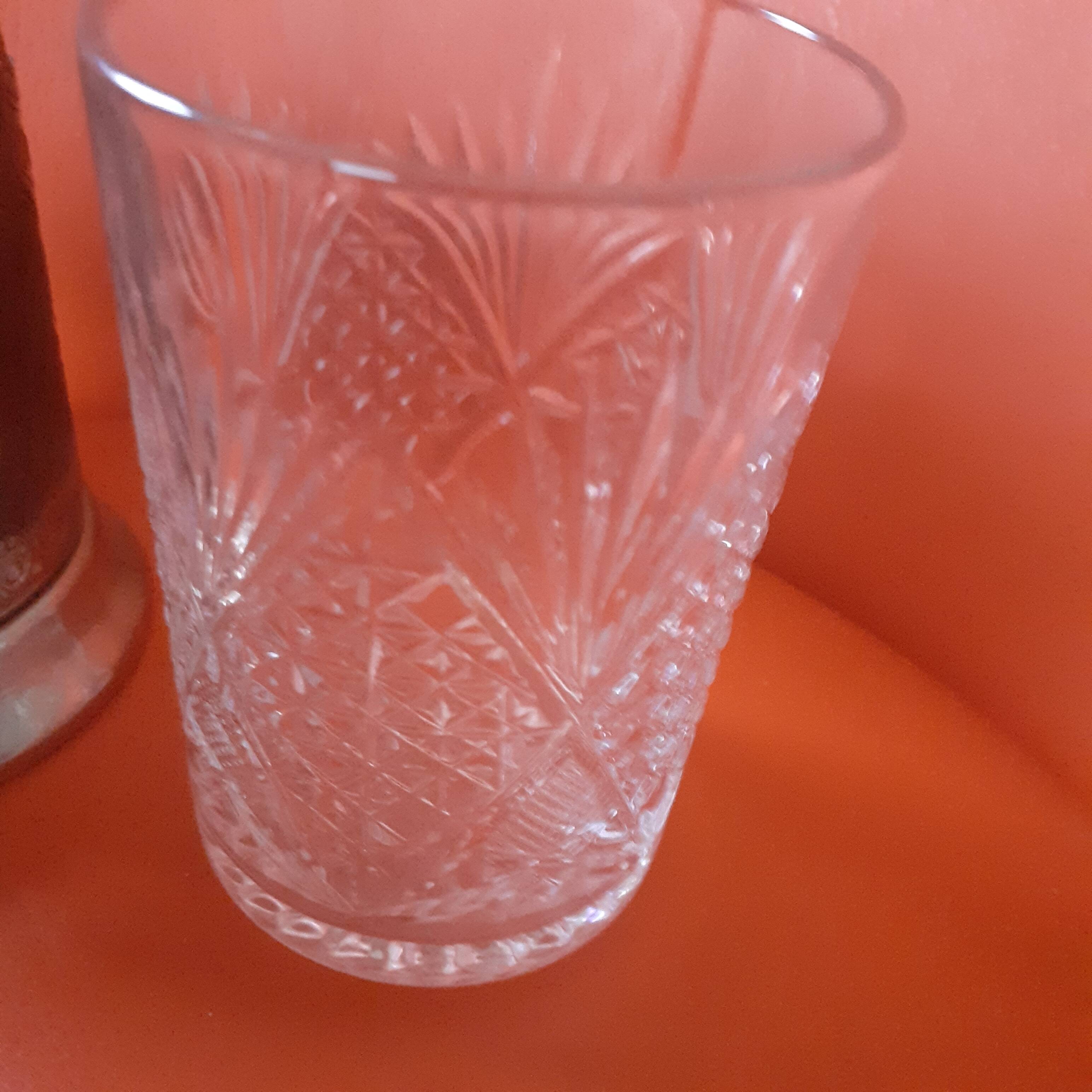 4 glasses engraved on their silver metal support;