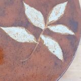 handcrafted trivet signed