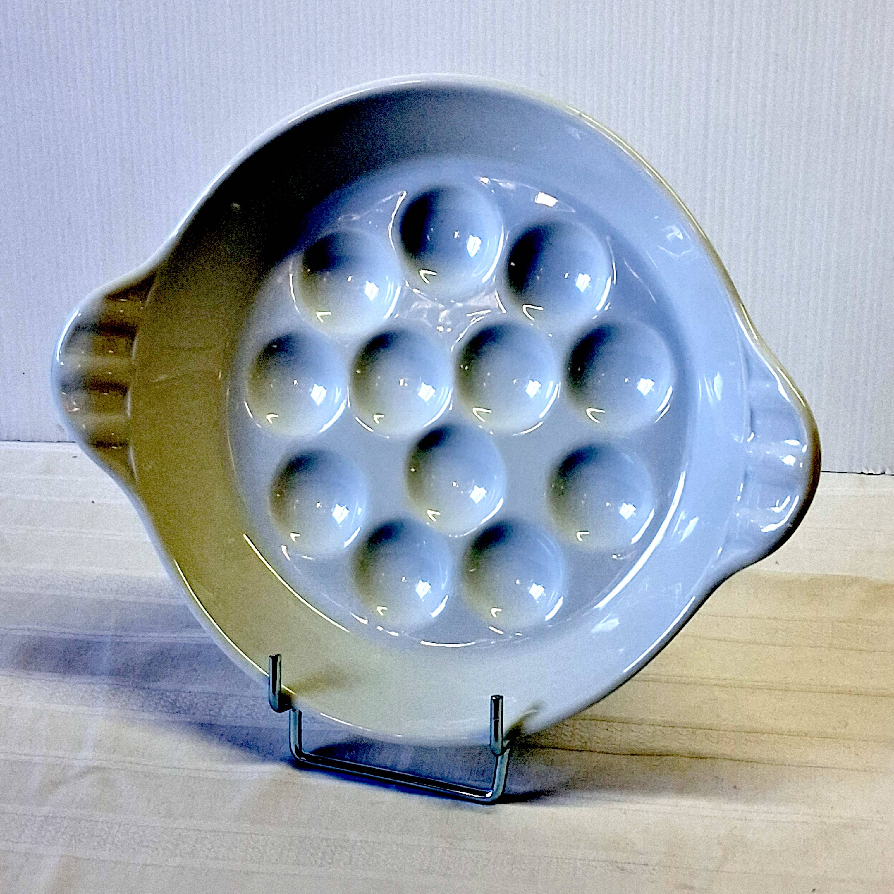 White Reussy porcelain snail dish in very good condition.