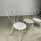 4 vintage wrought iron chairs