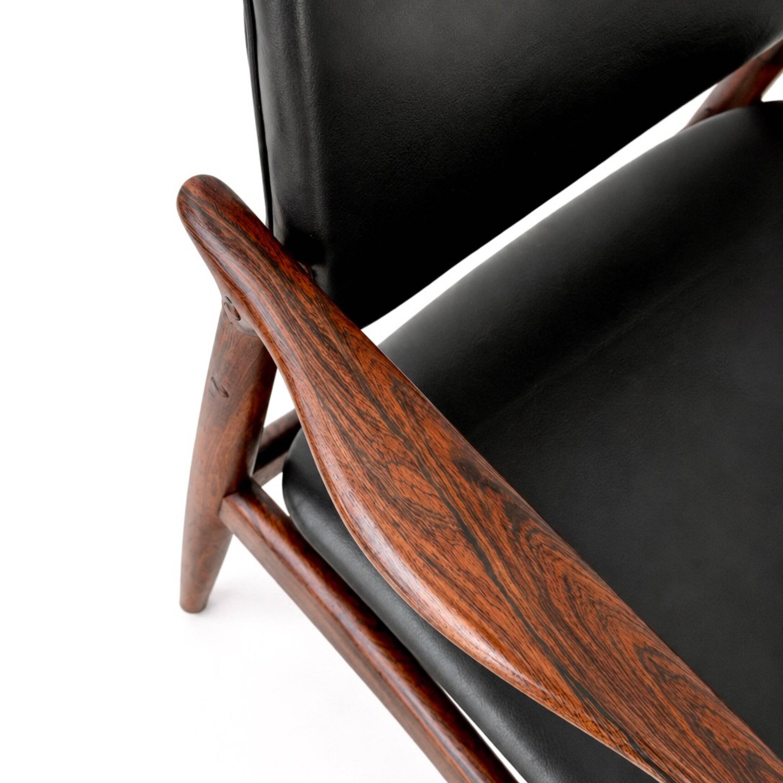 Captain armchair in rosewood by Erik Buch