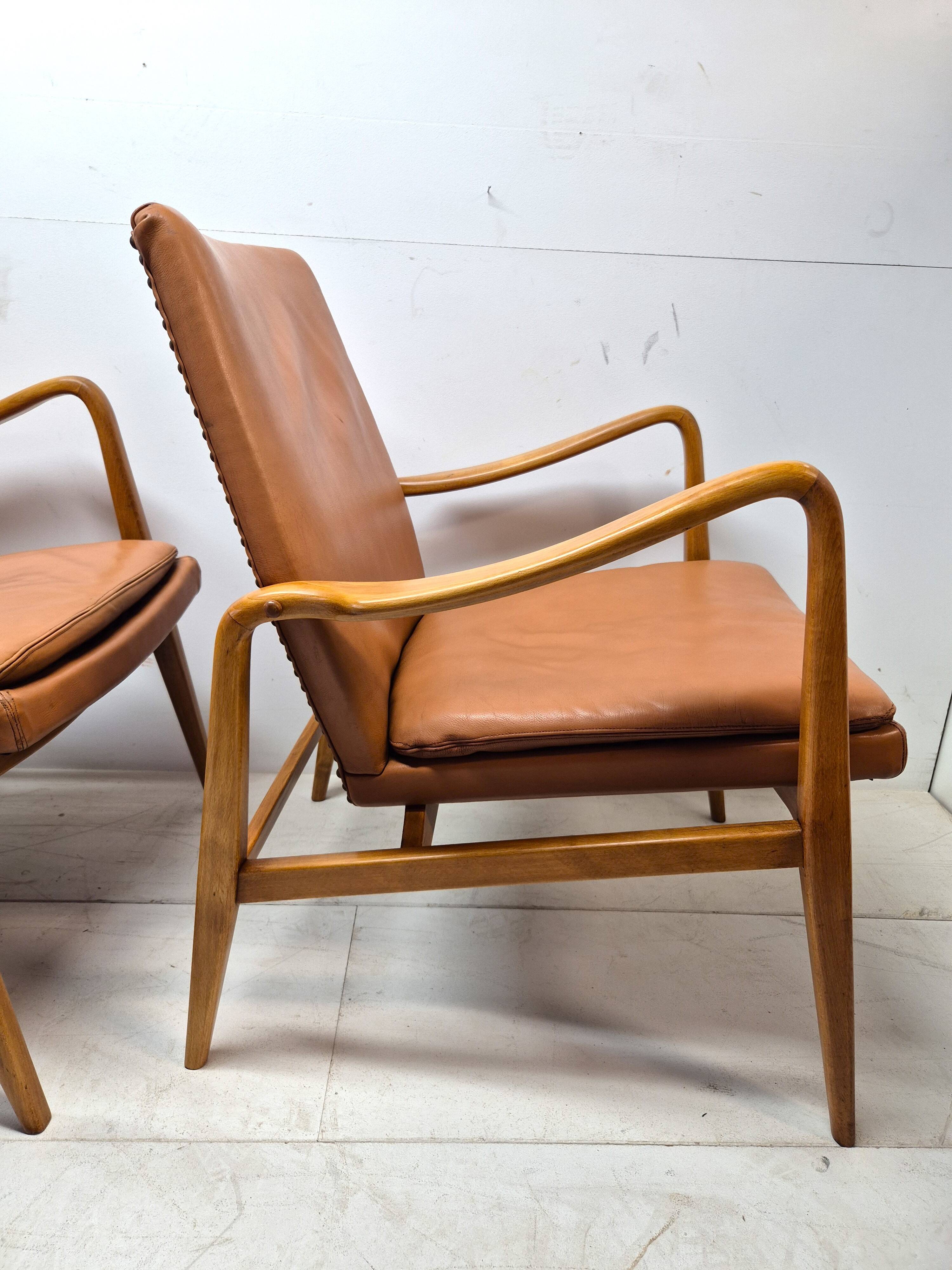 Pair of Scandinavian armchairs attributed to Axel Larsson, circa 1960.