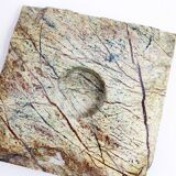 Pair of brutalist travertine candle holders