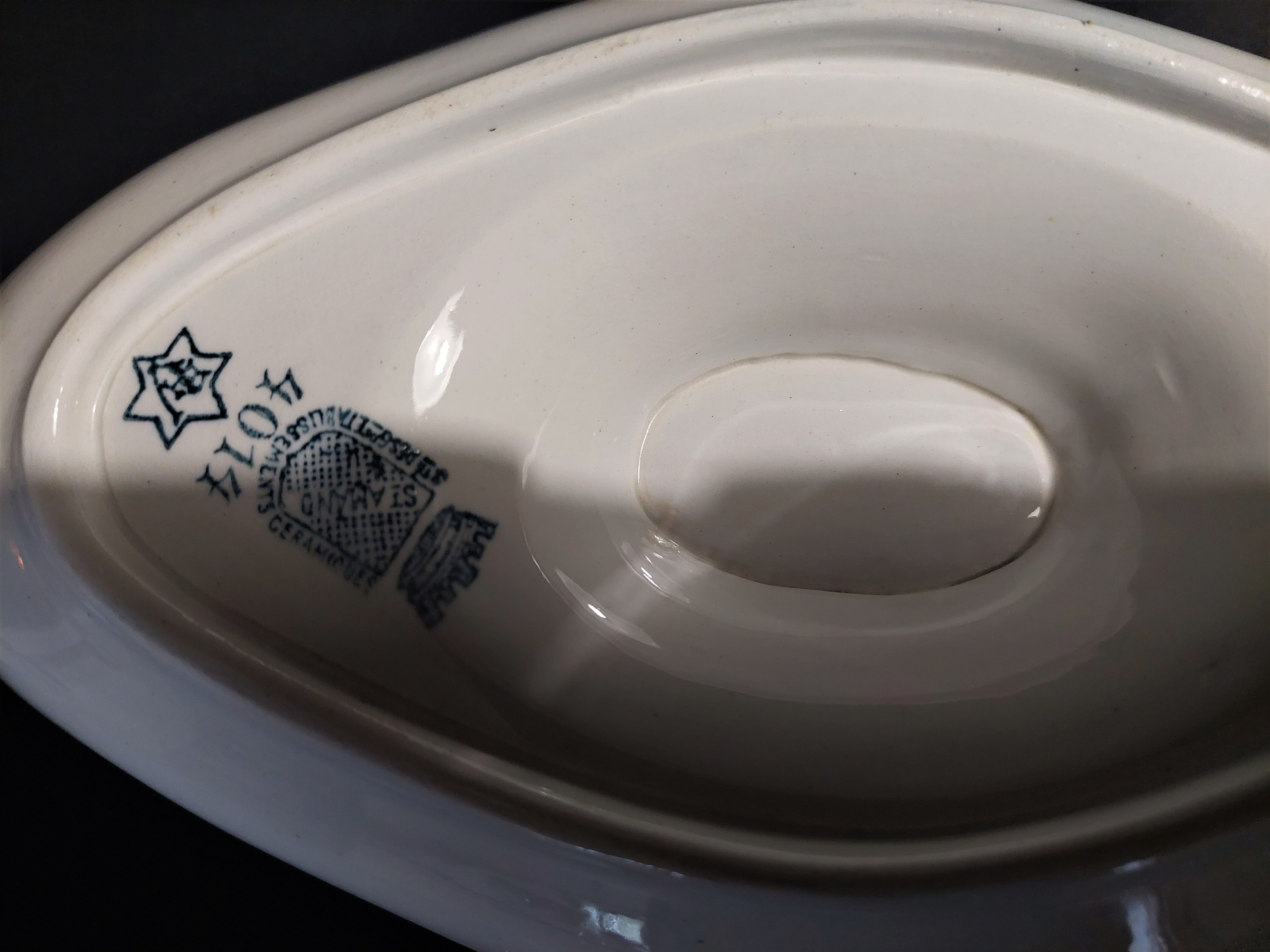 Faience sauce boat from Saint Amand
