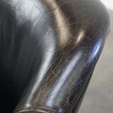 Black grained cowhide leather armchair