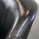 Black grained cowhide leather armchair