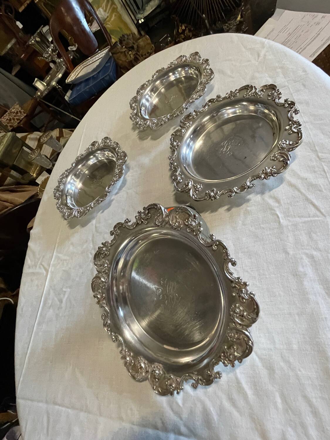 Set of 4 silver metal bottle coasters