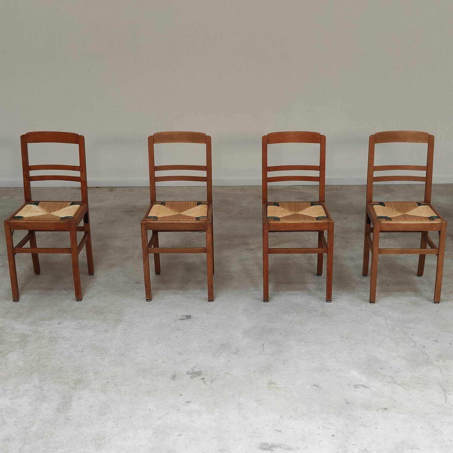 Set of 4 designer oak and straw chairs from the 1950s