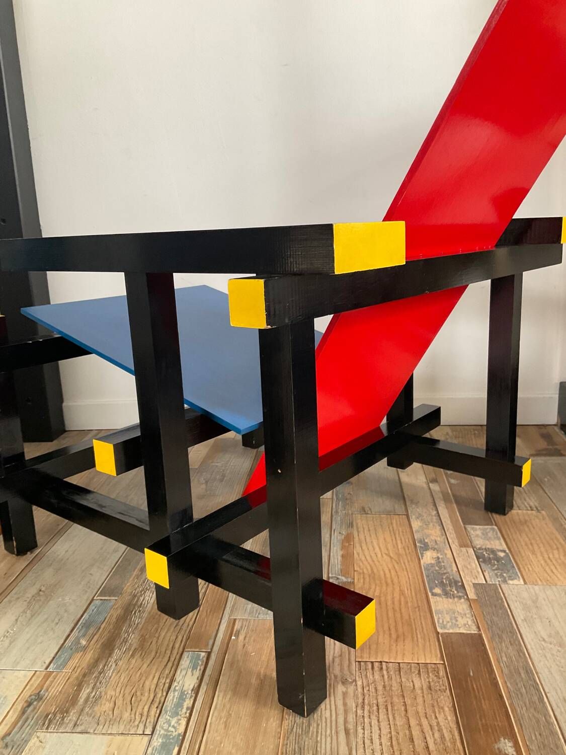 “Red and blue” lounge chair in the style of Gerrit Rietveld