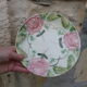 Ceramic plate dabbling old pink motifs