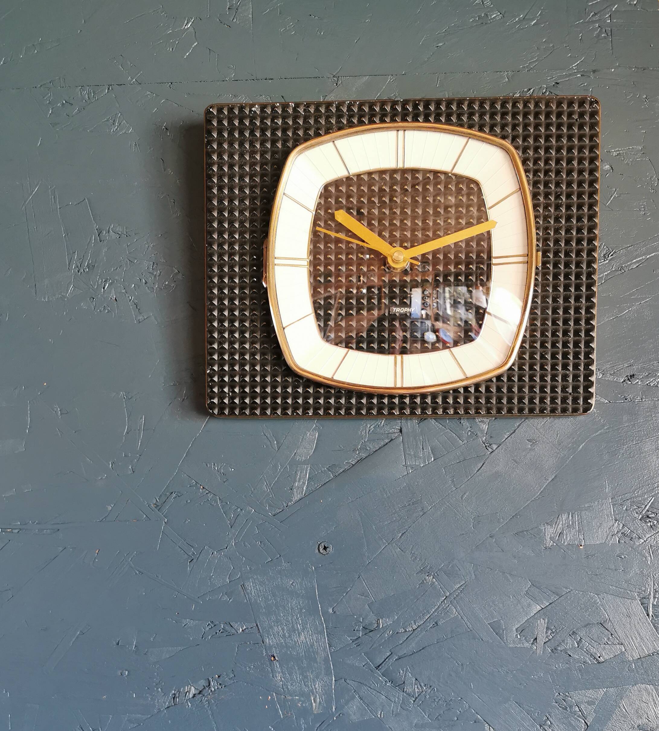 Vintage formica clock rectangular silent wall pendulum "Trophy black reliefs"