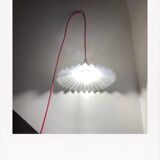 Pleated opaline suspension