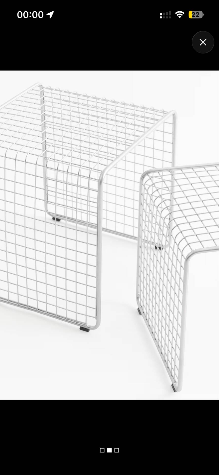 Nest of silver metal side tables