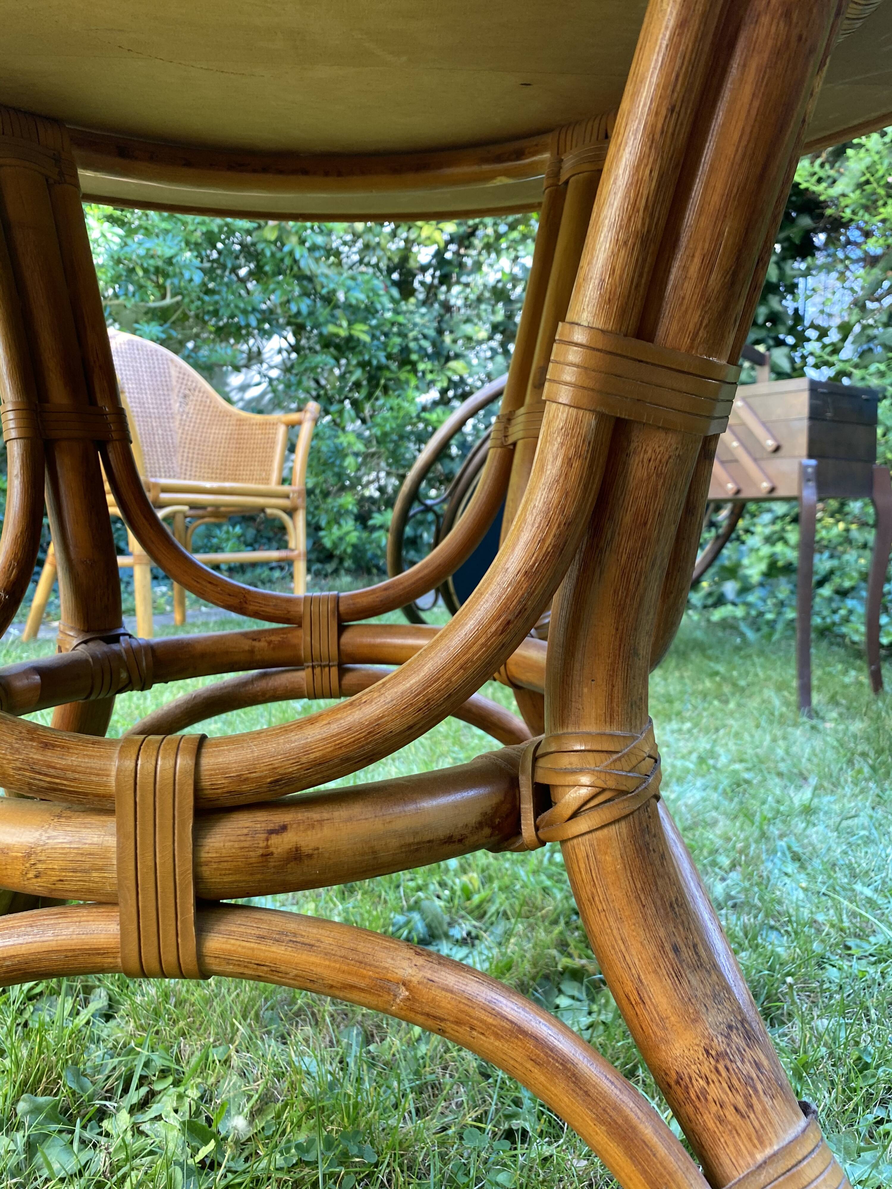 Canned rattan dining table and vintage glass