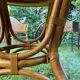 Canned rattan dining table and vintage glass
