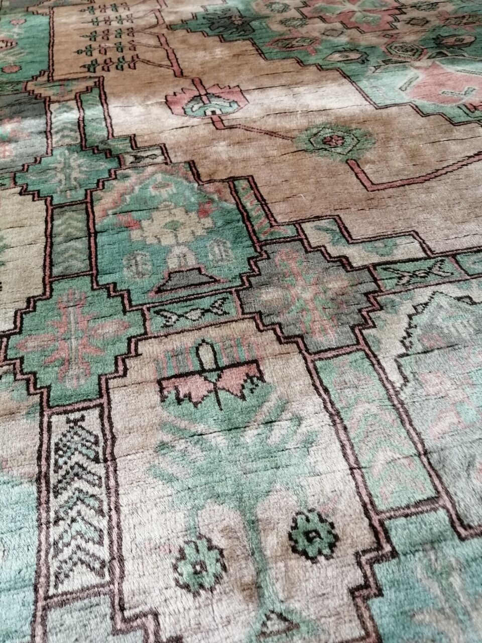 Afghan rug in pastel colors