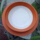 Orange Limoges porcelain plates
