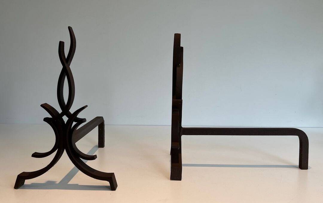 Pair of Wrought Iron Andirons with Stylised Flamboyant Uprights and Enrobed Feet