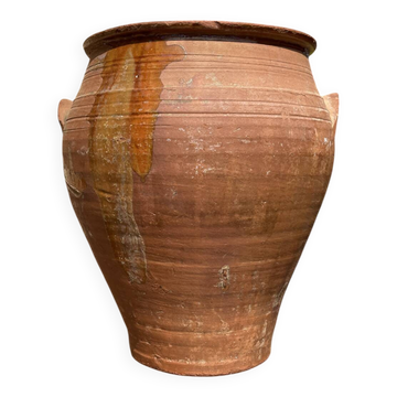 Ancient terracotta pottery jar