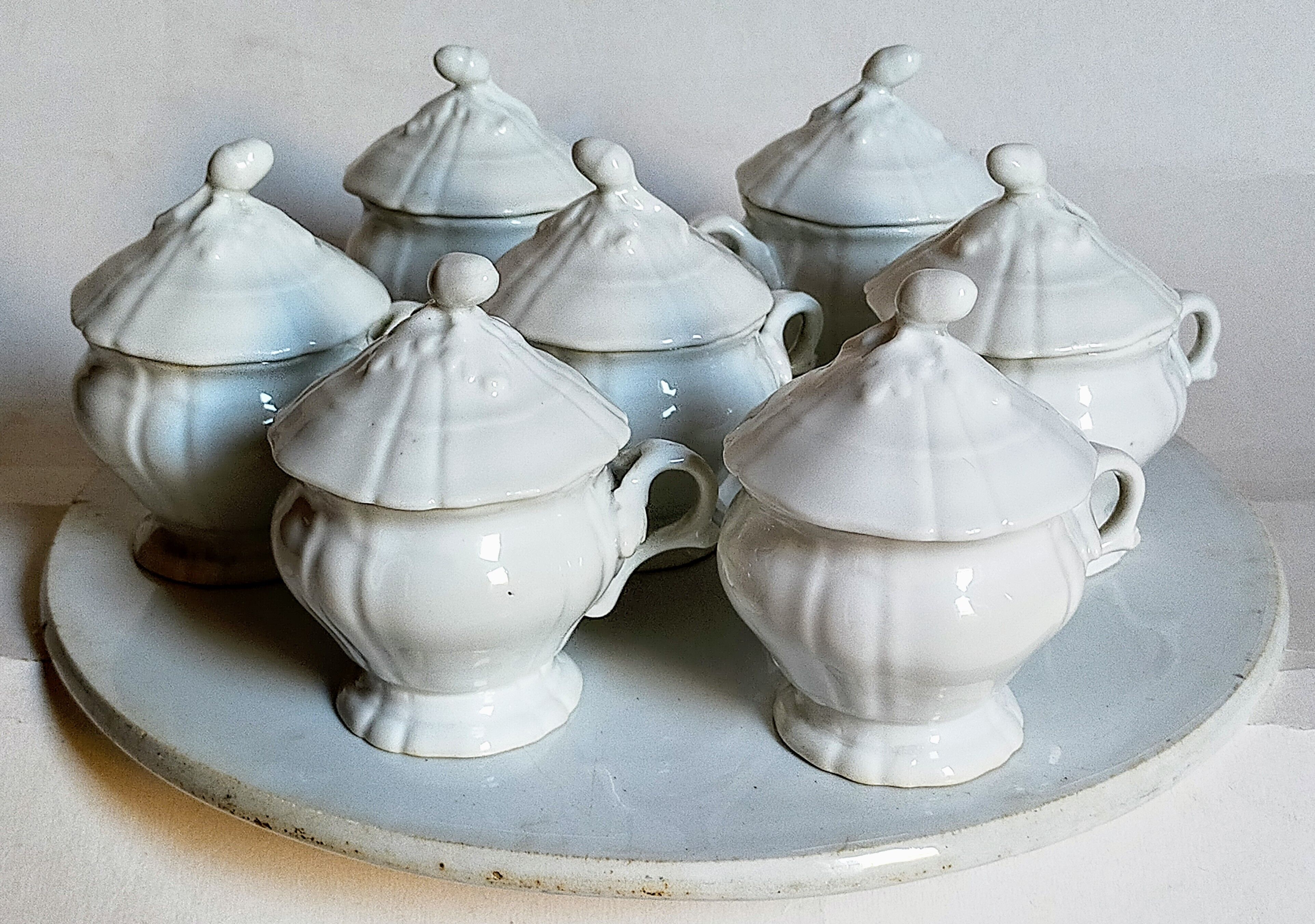 Set of seven covered pots and tray old white slurry nineteenth