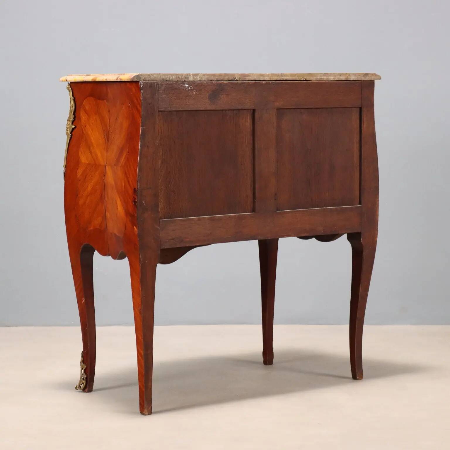 Antique commode in Baroque style made of mahogany, 20th century.