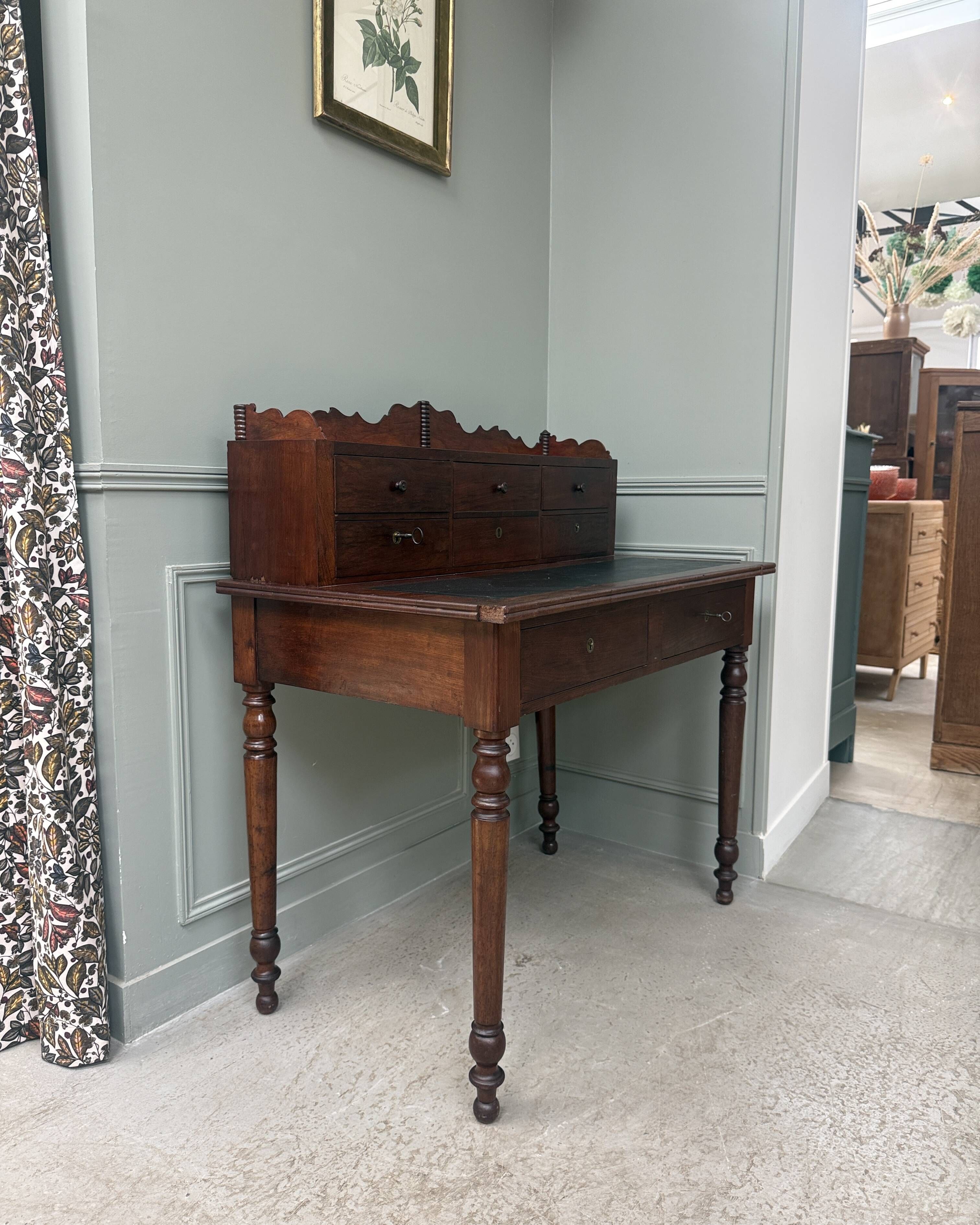 Antique mahogany graduated desk