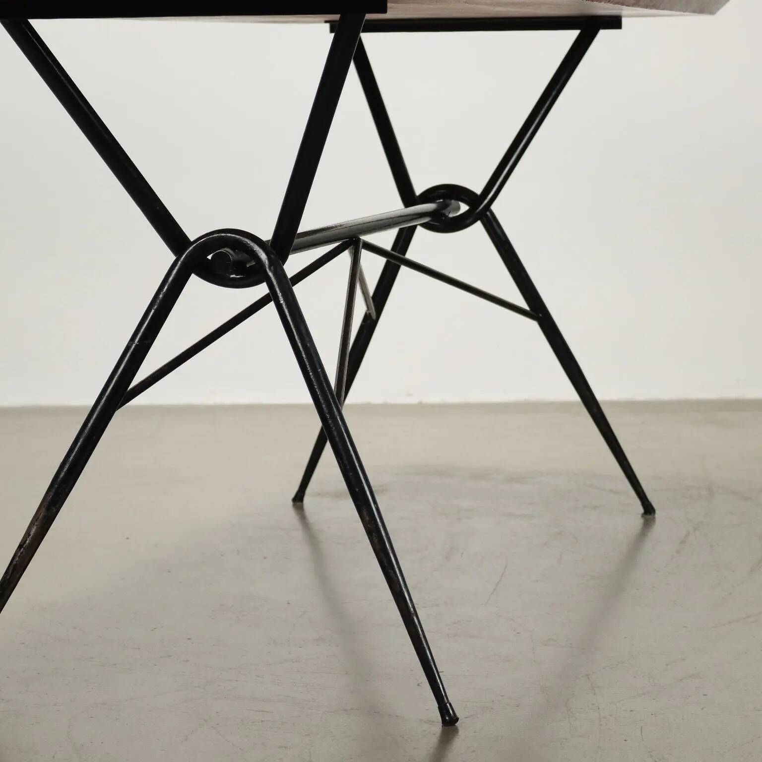 1960s vintage table made of wood and metal with a glass top, Italy.