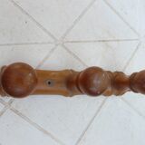 Wall-mounted coat rack circa 1940 in turned wood with 3 hooks