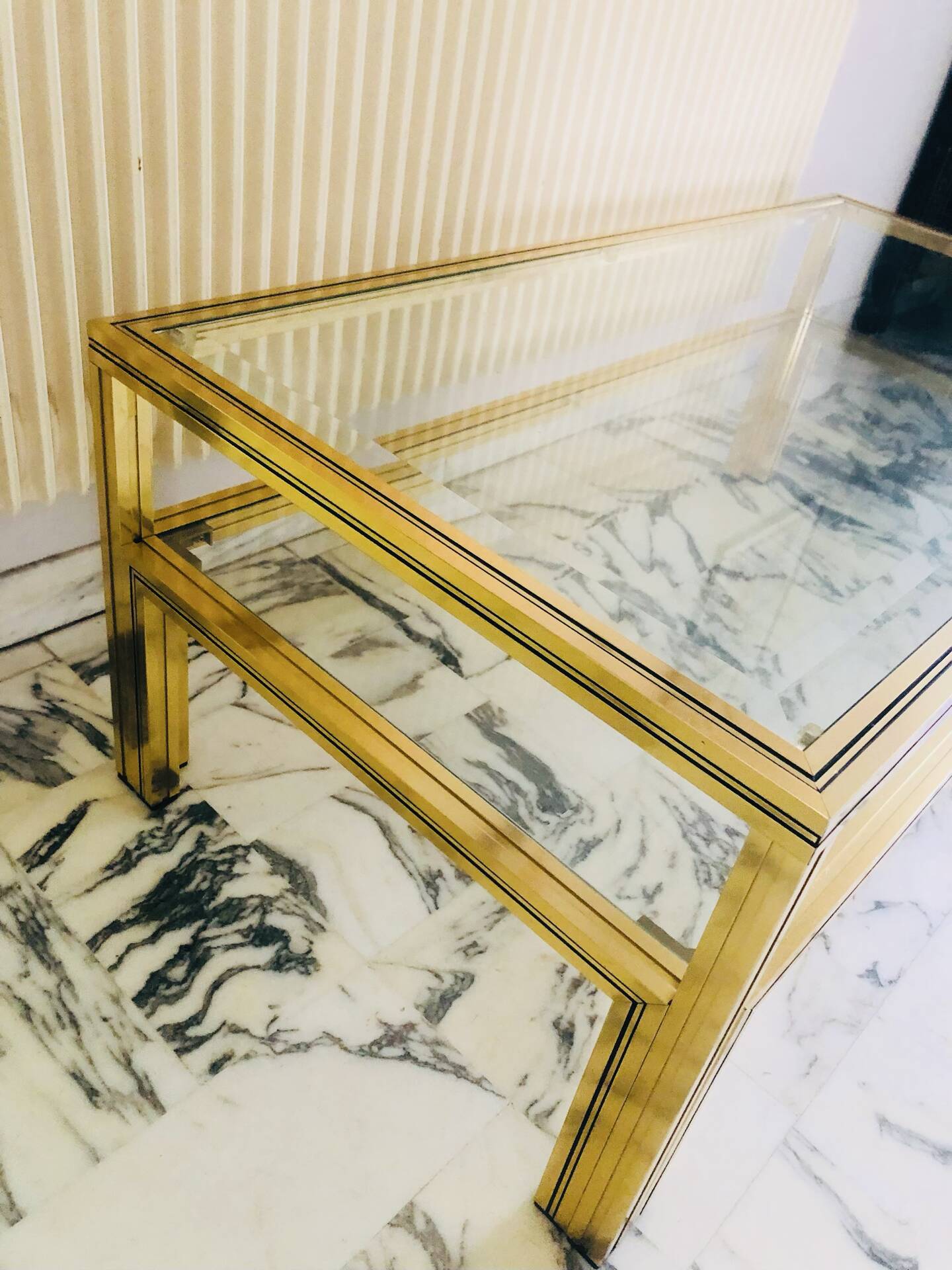 Coffee table with 2 brass and glass tops signed Pierre Vandel Paris, circa 70s.