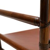 Manou rattan armchair with leather seat, 1960