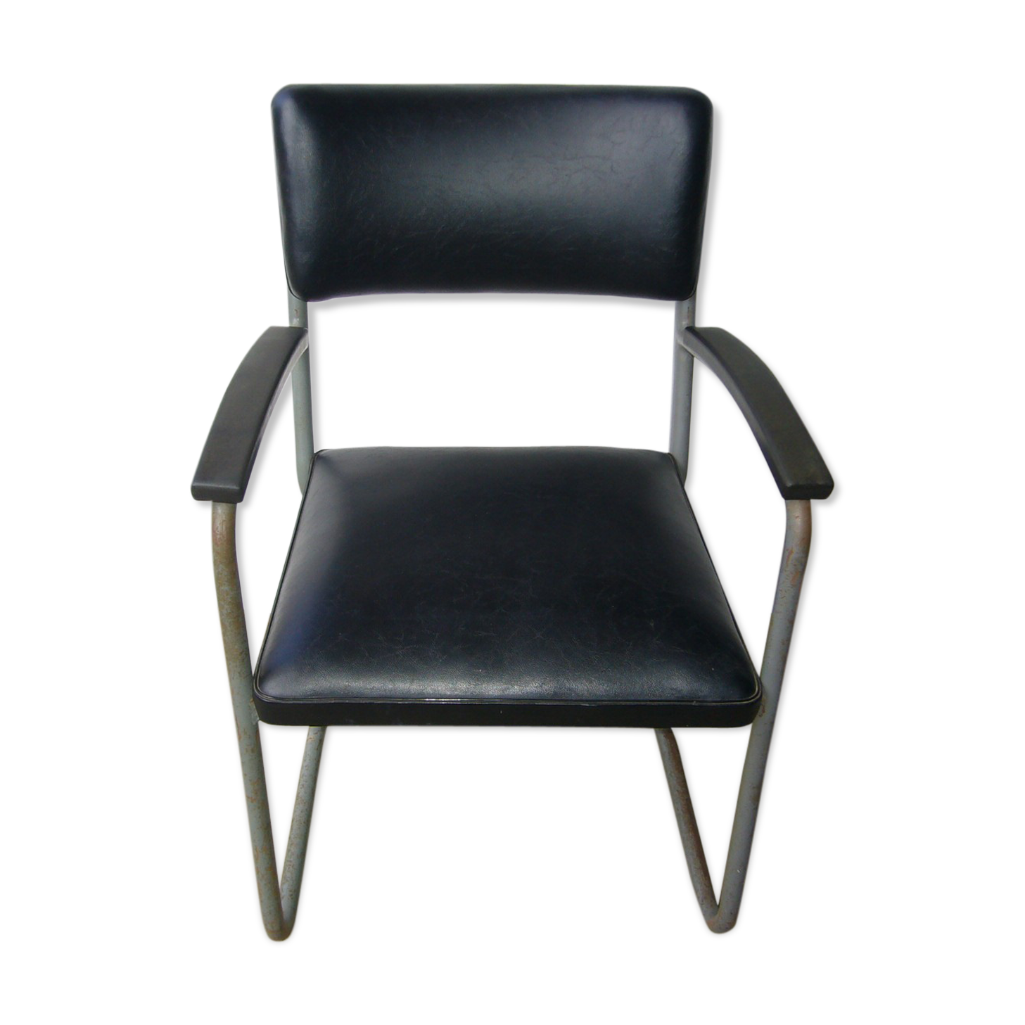 Old industrial chair in skai and metal