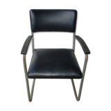 Old industrial chair in skai and metal