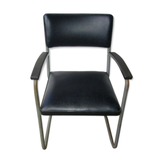 Old industrial chair in skai and metal