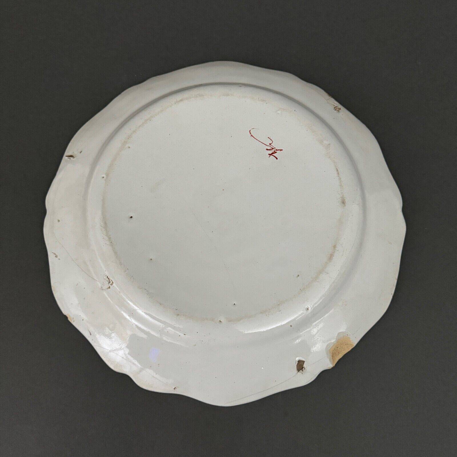 Large Rouen dish, 19th century, floral decoration