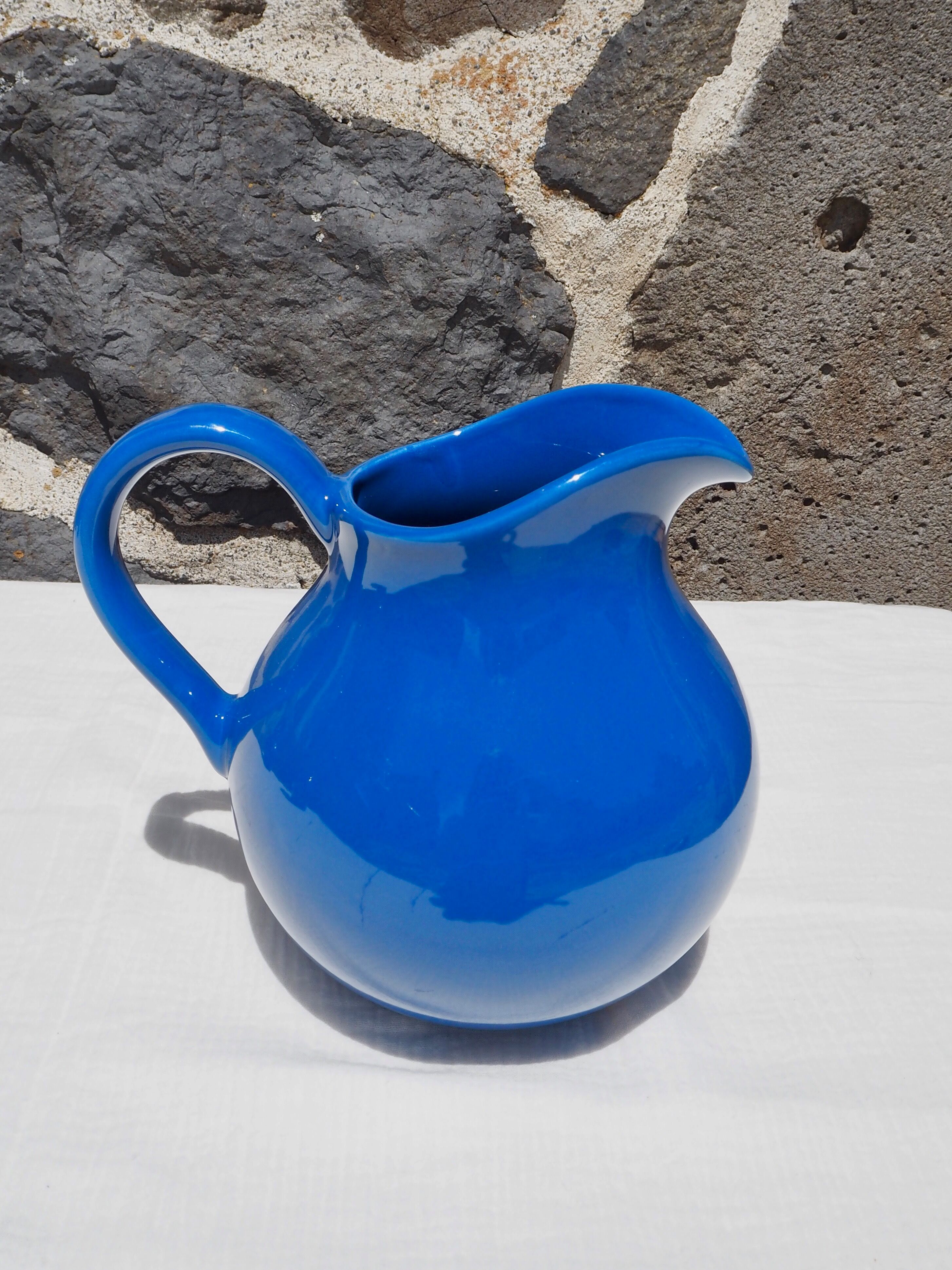Blue ceramic belly pitcher