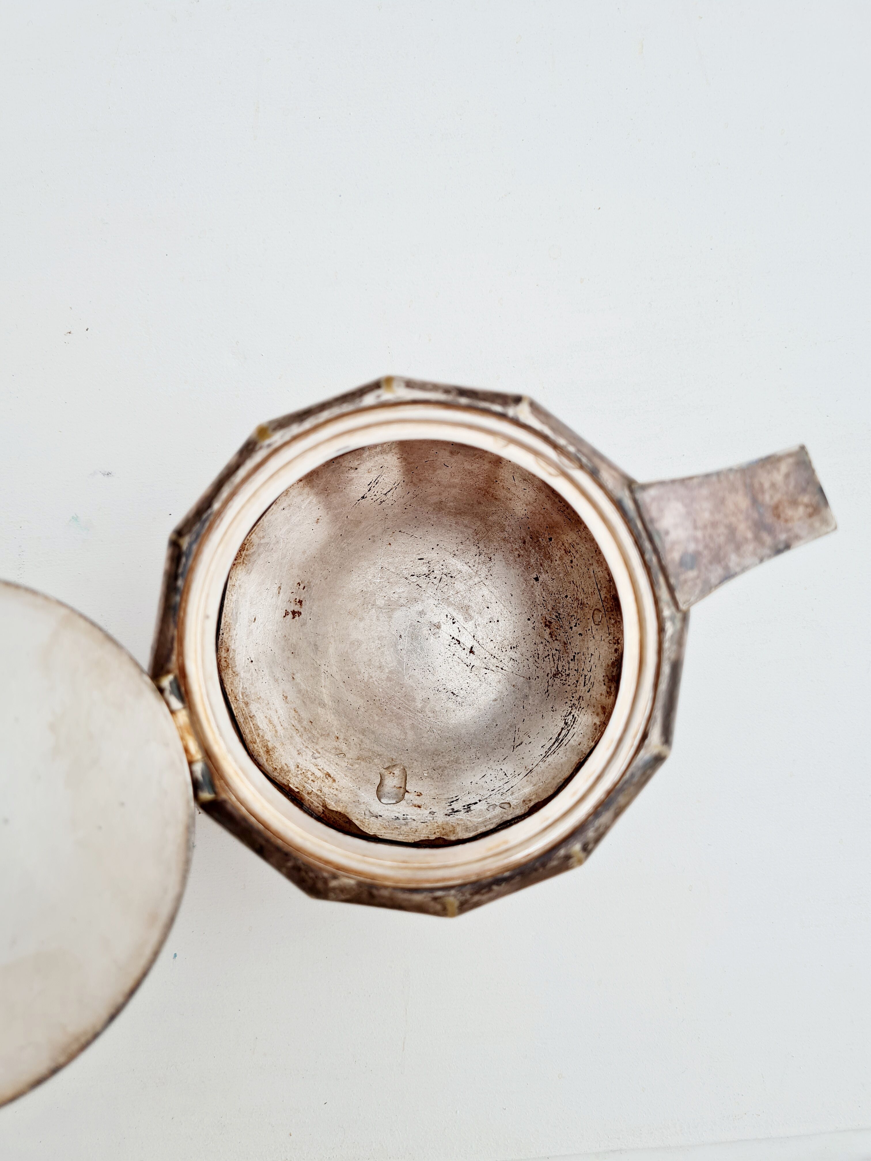 Old silver and wood teapot