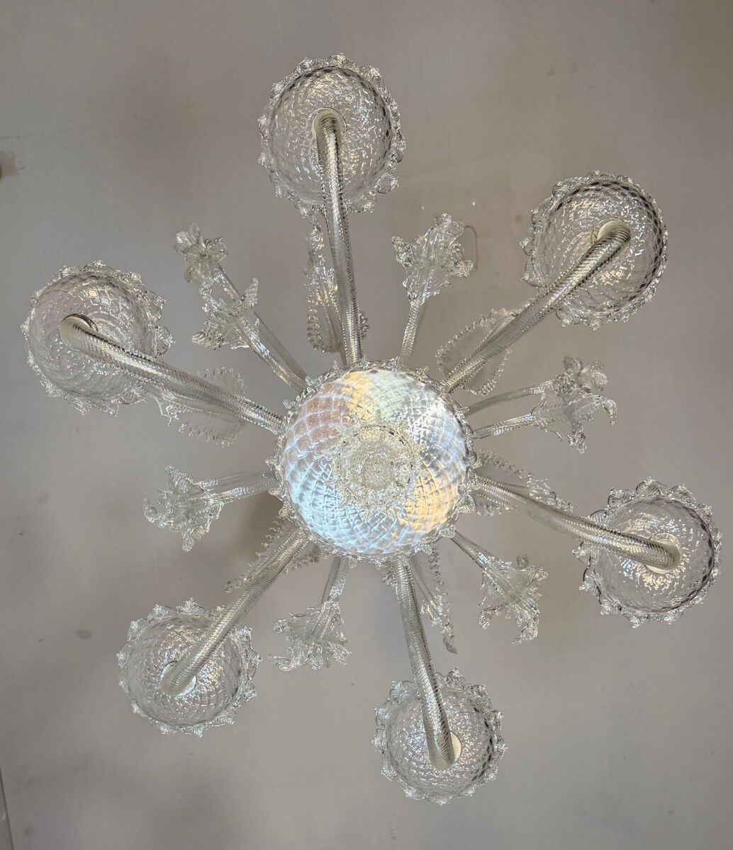 Venetian chandelier made of Murano glass, six light arms, circa 1940.