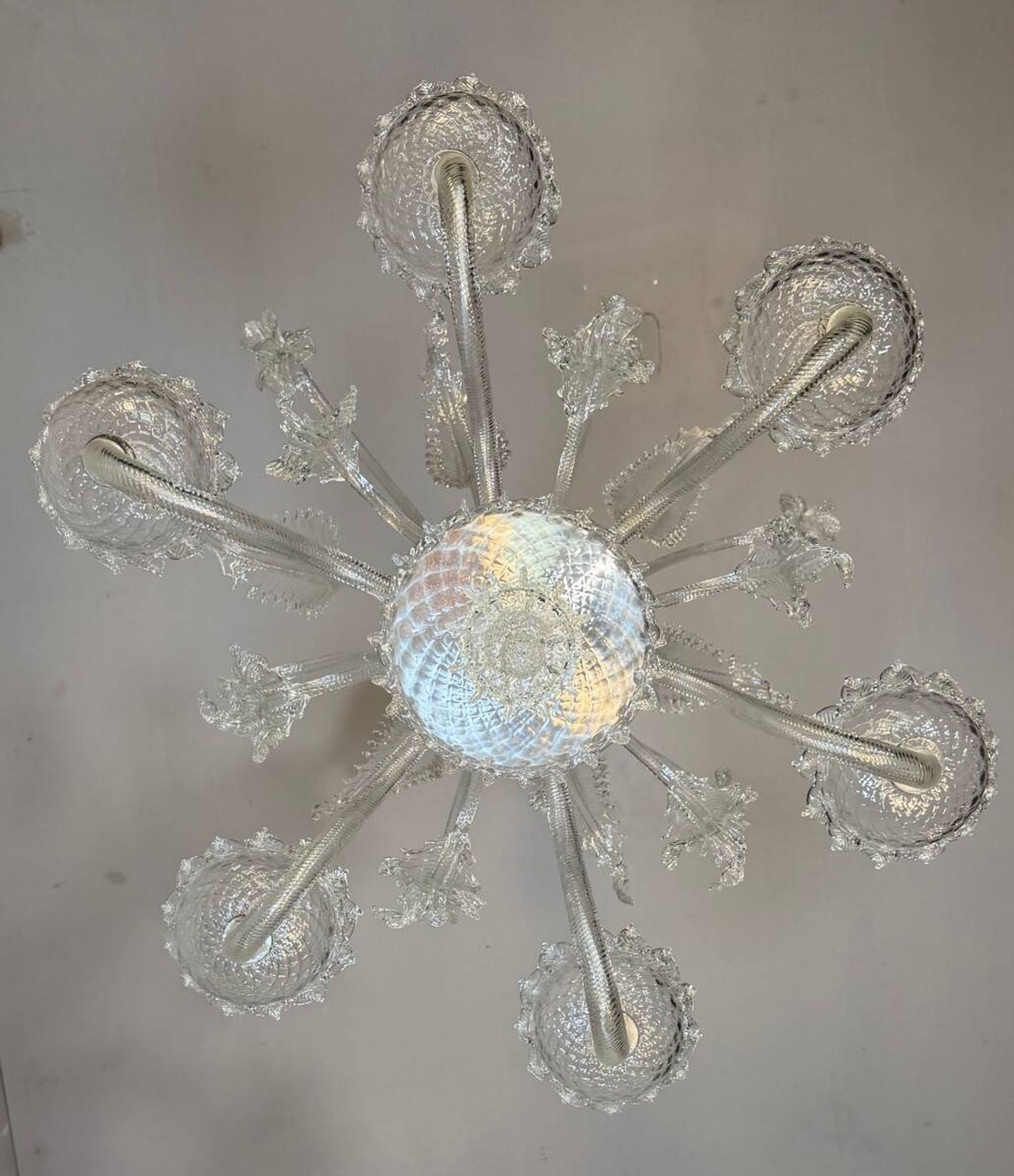 Venetian chandelier made of Murano glass, six light arms, circa 1940.